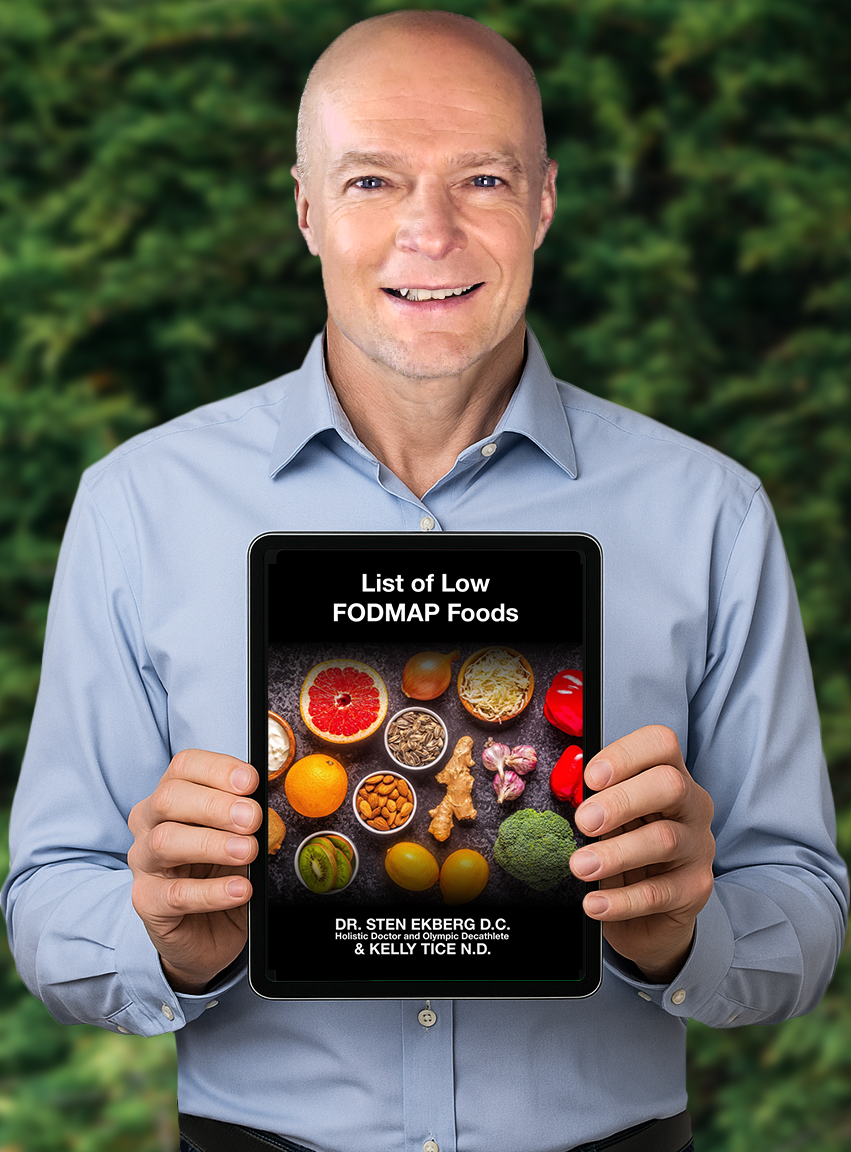 Dr. Sten Ekberg Holding Up "List of Low FODMAP Foods" eBook by Dr. Sten Ekberg and Kelly Tice N.D.