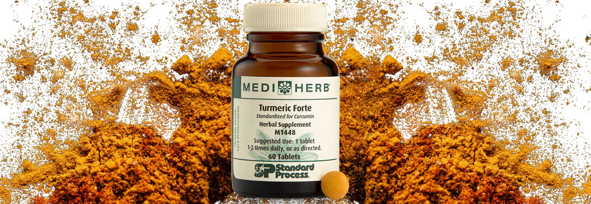 Bottle of MediHerb Turmeric Forte supplement surrounded by turmeric powder on a white background